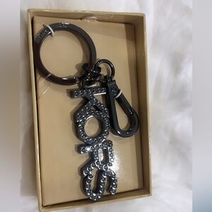 Brand new with tag Michael Kors key chain holder. It’s is a gorgeous keychain!